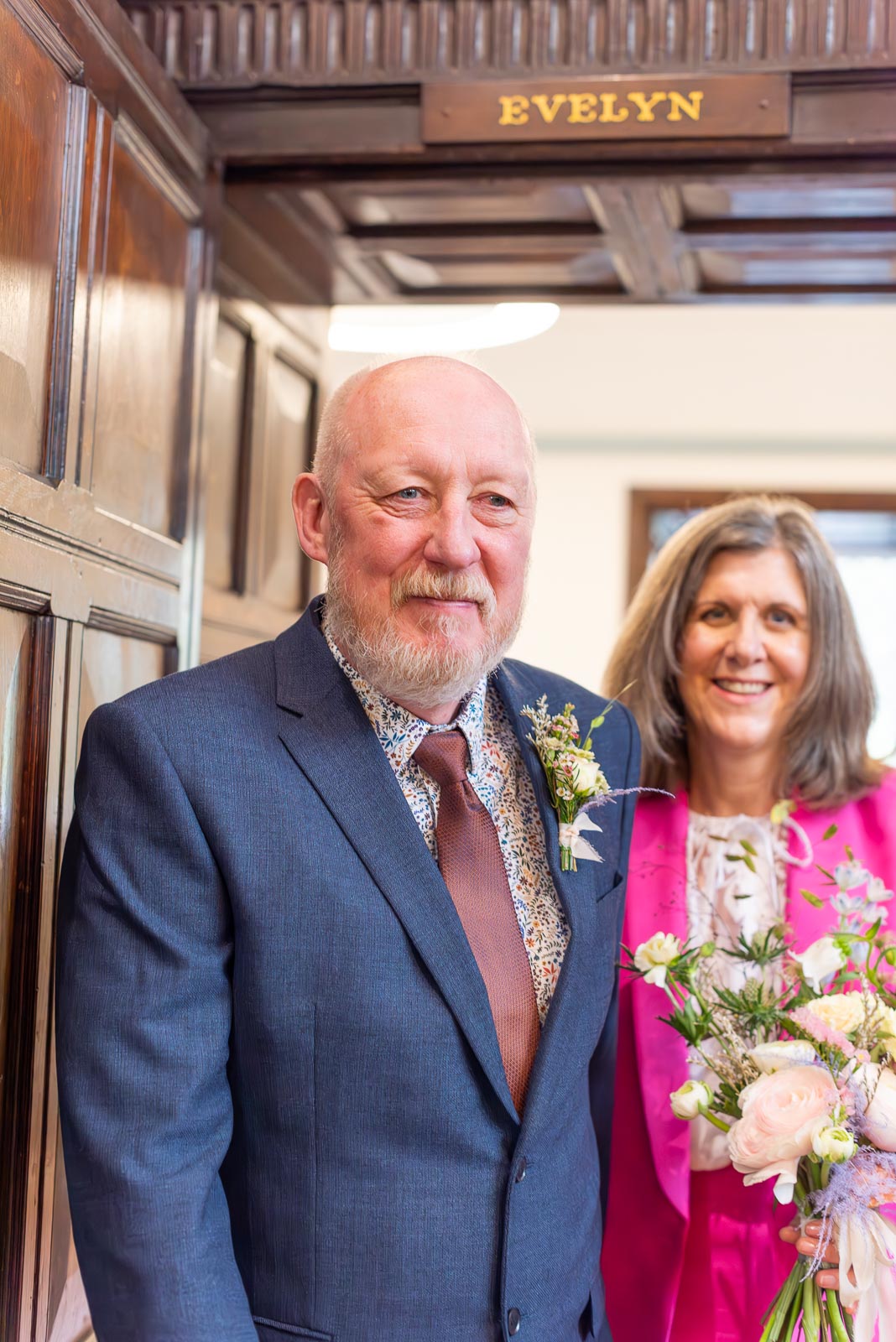 Helen and Tony leave the Evelyn room at Lewes Registry Office following their wedding
