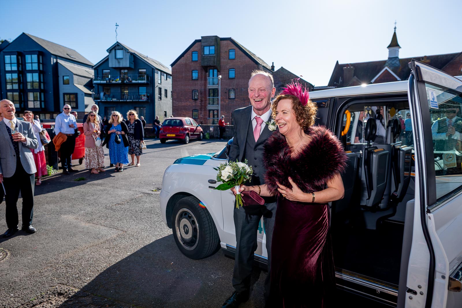 Jill and John arrive at the John Harvey Tavern following their wedding in Lewes