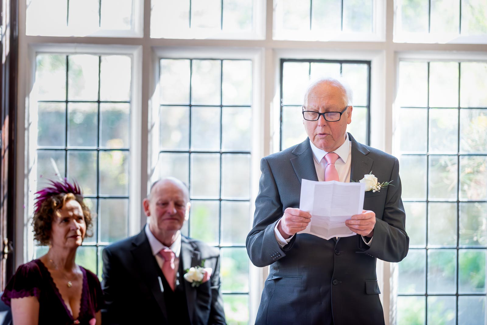 John's best man reads a poem during his wedding to Jill in the Ainsworth Room at the Lewes Registry Office