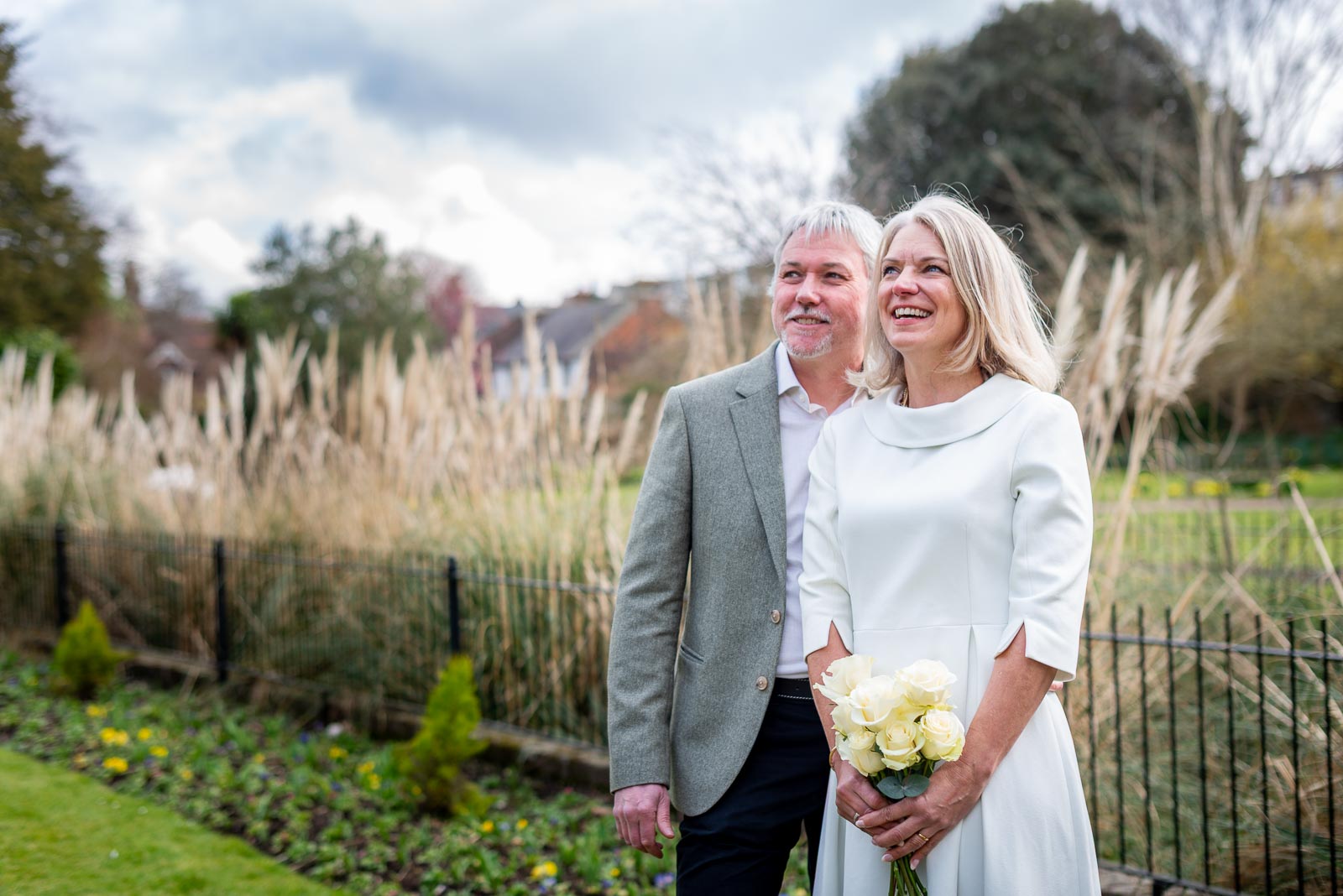 Jo and Darren enjoy some fair weather in Southover Grange Lewes after their wedding