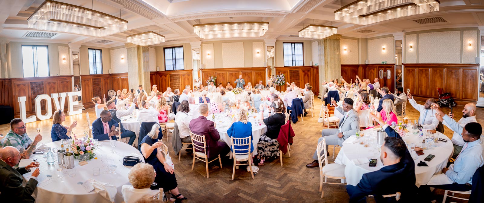 Lewis charges a toast to his wife Sarah in the Blencowe Room at Pelham House Hotel, Lewes following their wedding.