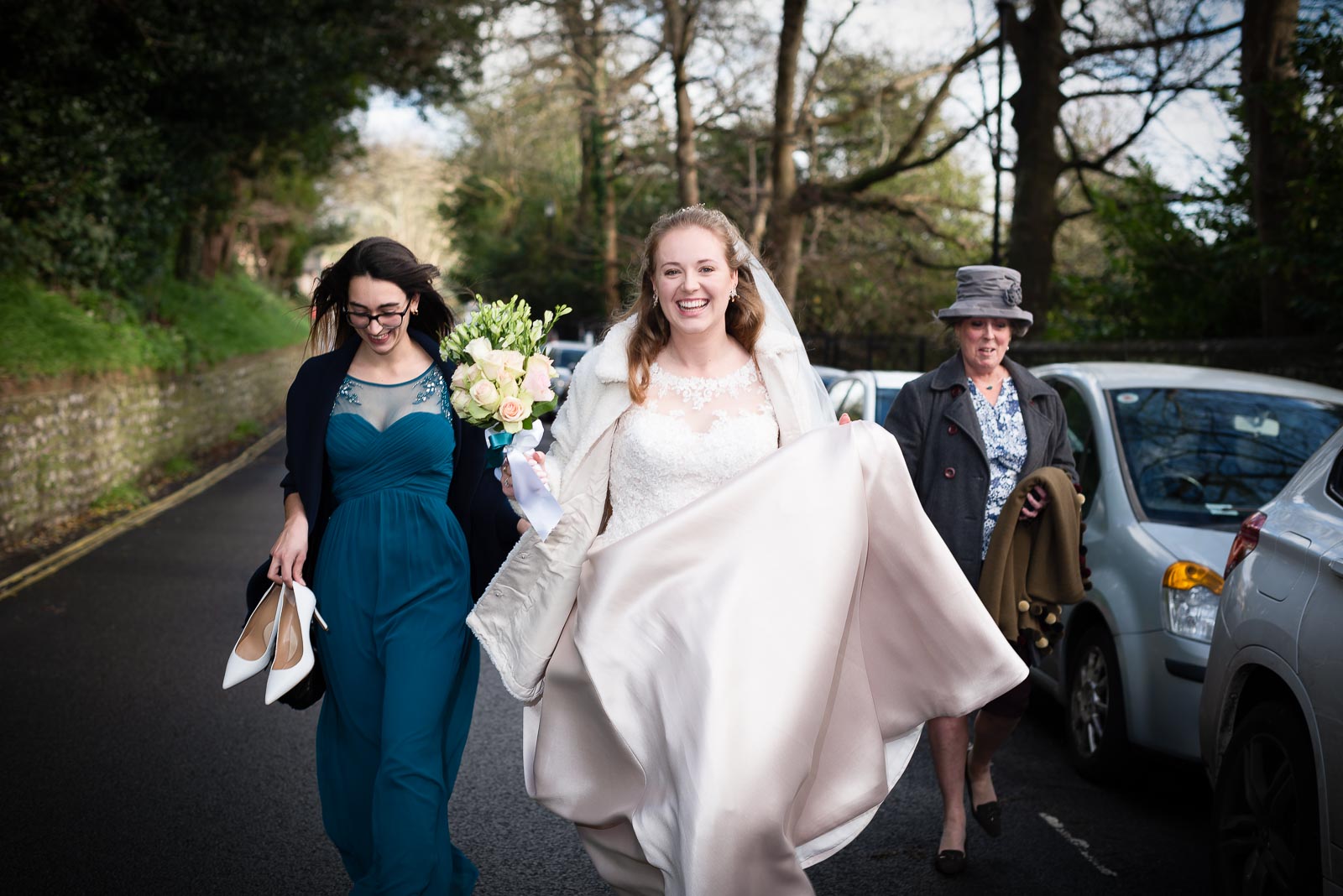 Belinda walks up Grange Road with her mum and sister on her way to get married to Chris in Lewes Register Office
