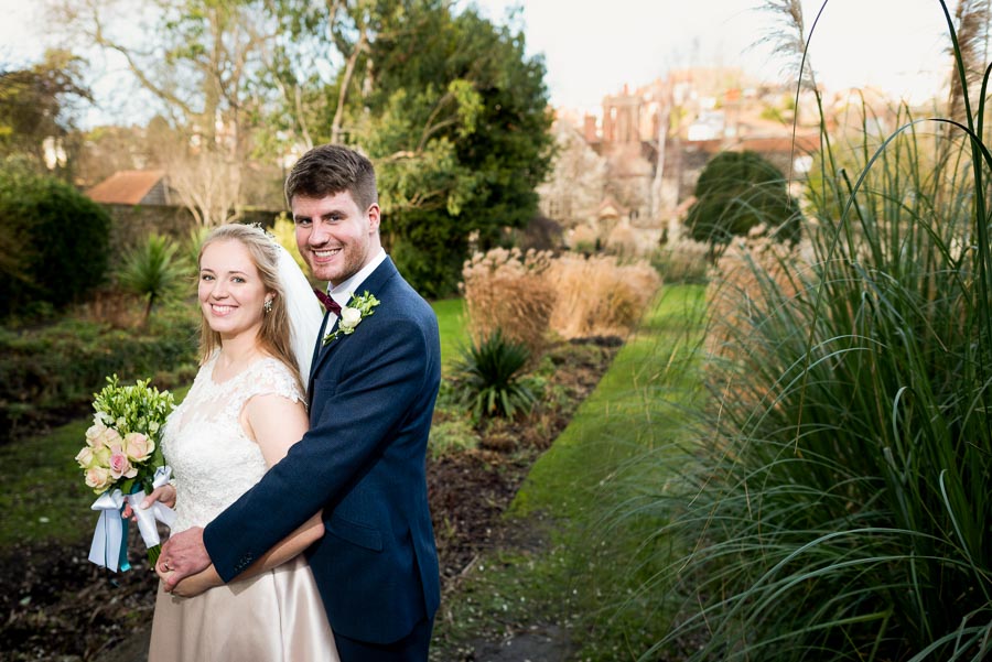 Belinda and Chris pose in the gardens at Southover Grange, Lewes.