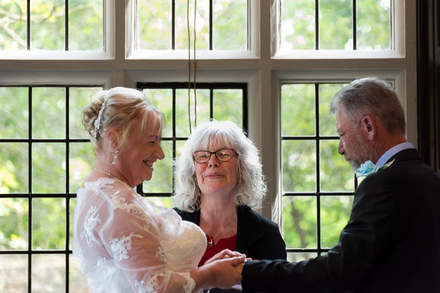 Wendy and Jason enjoy a funny moment whilst exchanging vows at their wedding in Lewes Register Office.